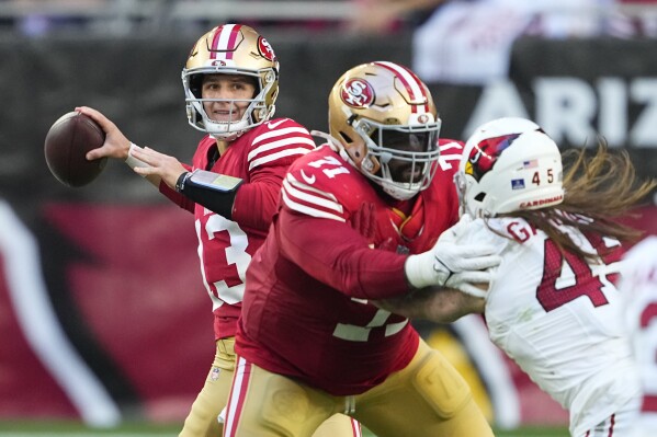 McCaffrey scores 3 TDs and 49ers clinch NFC West with 45 29 rout